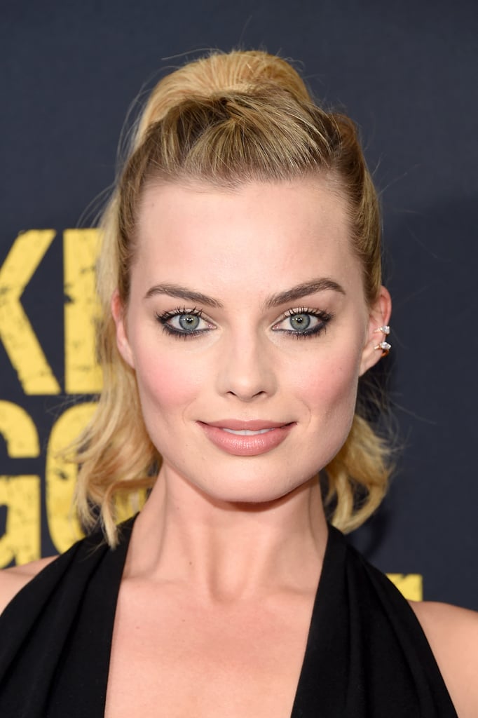 Margot played up the sparkle by completing her look with edgy stud earrings.