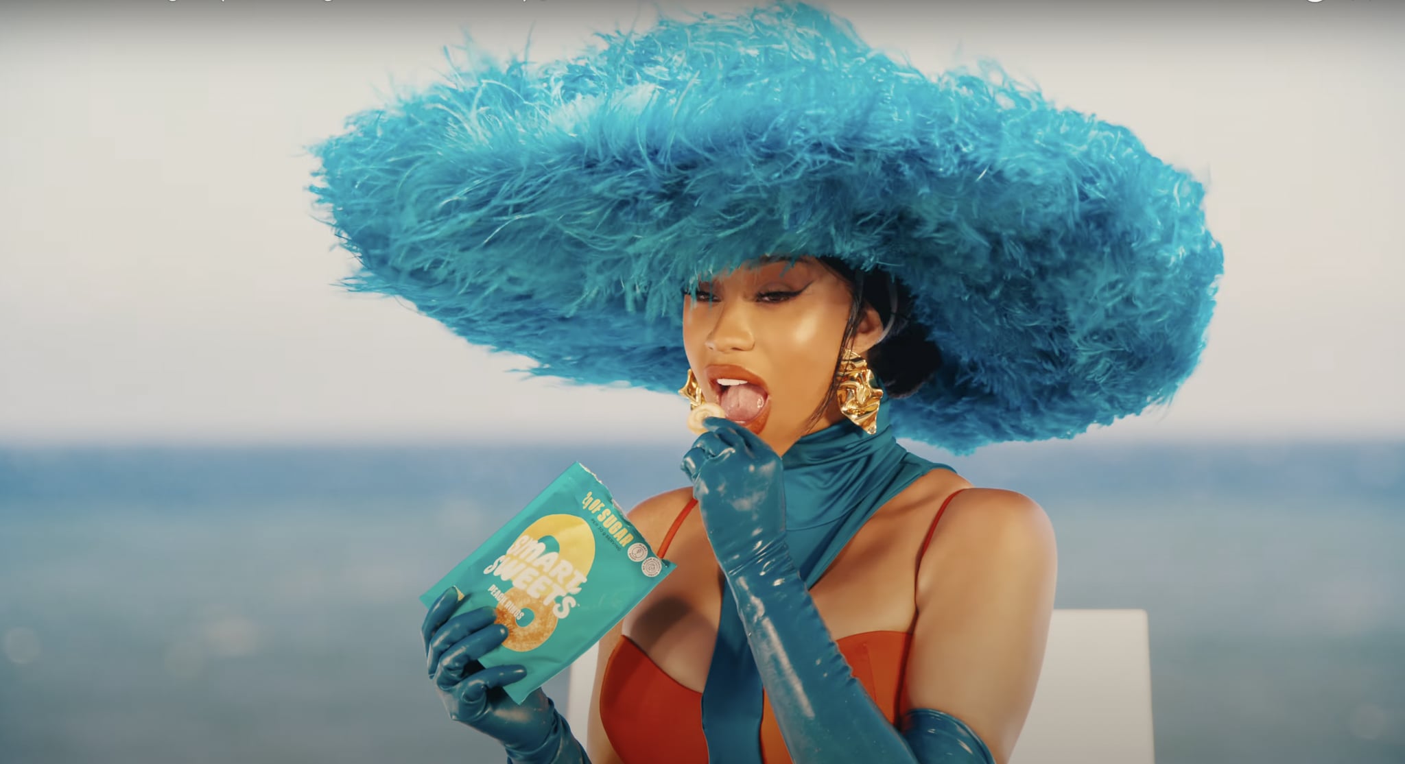 Cardi B eating smart sweets gummies in "Bongos" music video