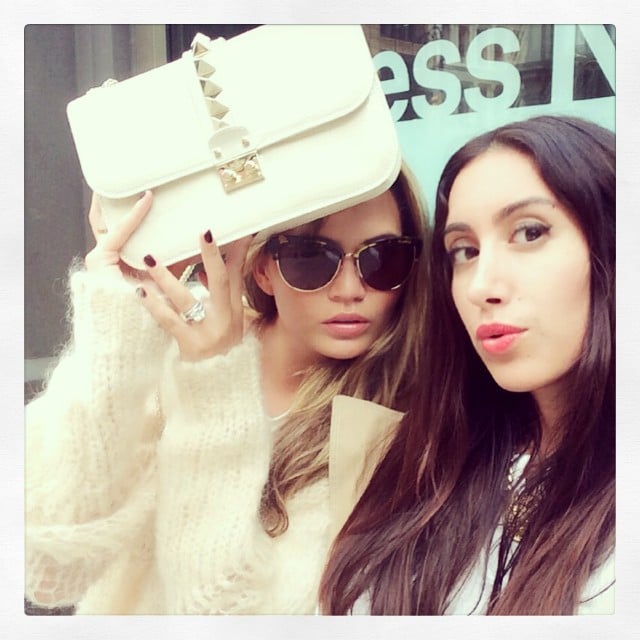 Chrissy Teigen struck a fierce pose with her purse and friend.
Source: Instagram user chrissyteigen