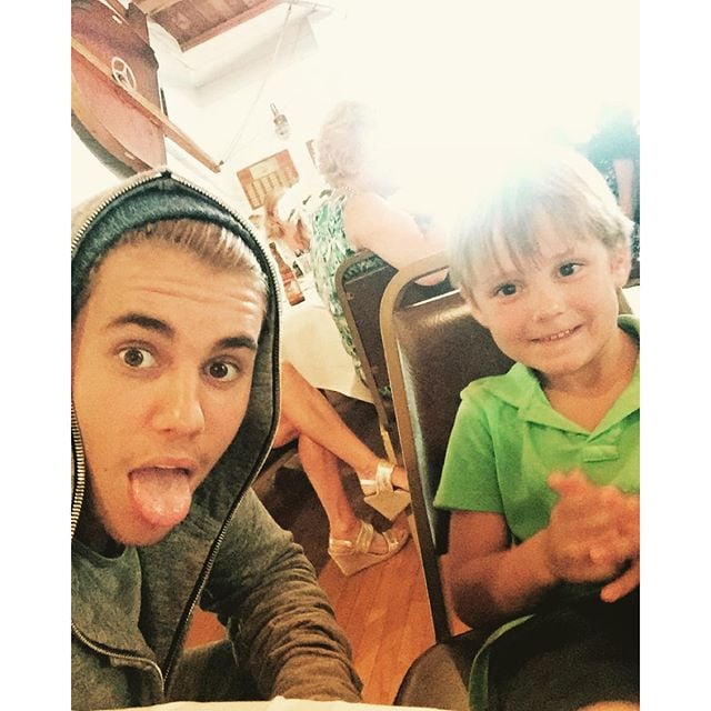 Justin seems to love running into fans outside of official events and frequently shares moments with them on social media. The singer posted this sweet shot on Instagram in September 2015 of him and "his boy" Cooper.