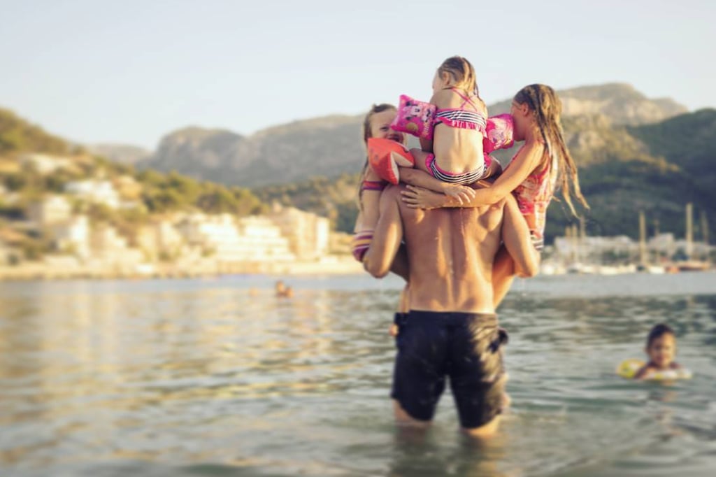 This dad is basically a human jungle gym.