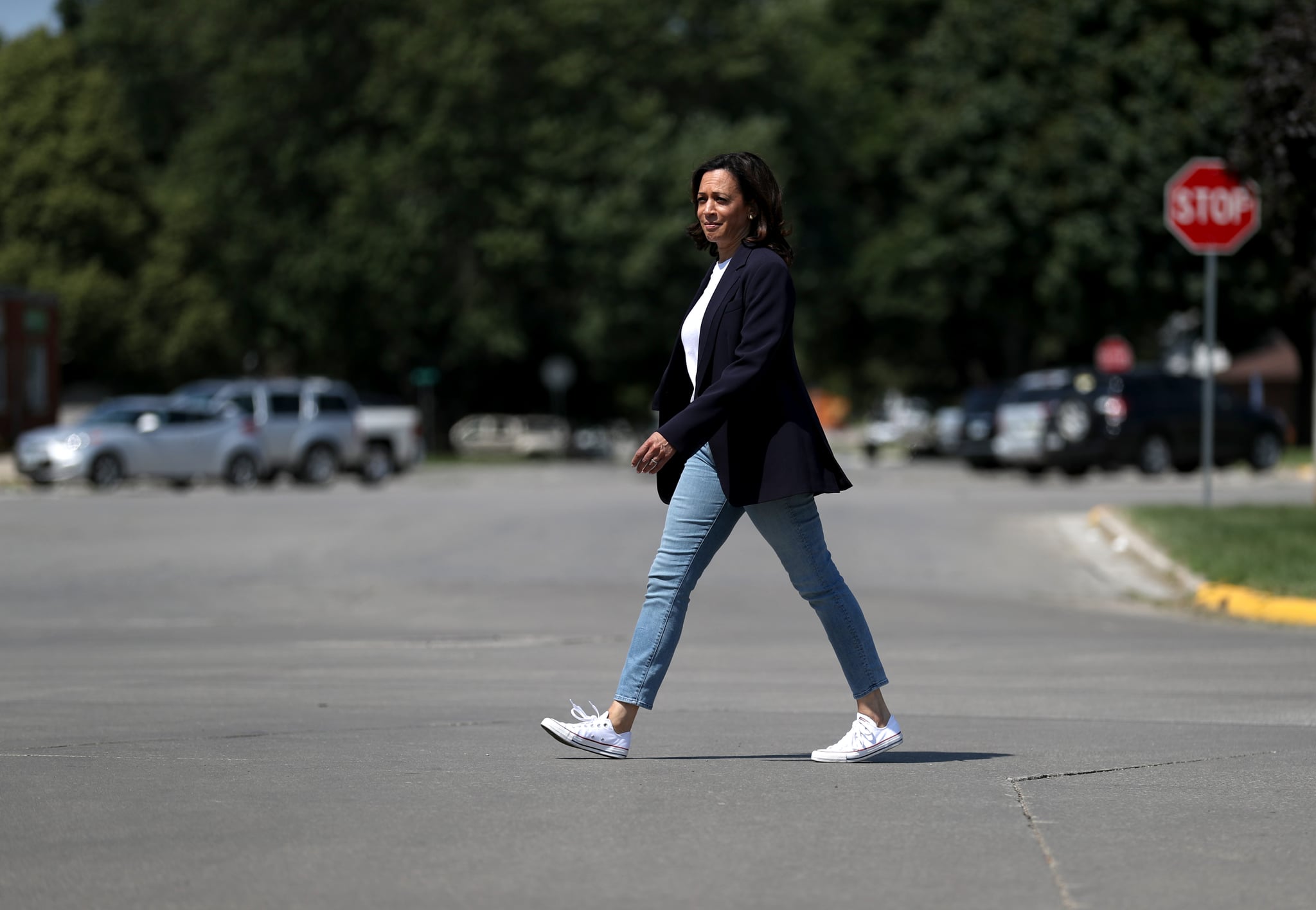 STORM LAKE, IOWA - AUGUST 09: Democratic presidential hopeful U.S. Sen. Kamala Harris (L) (D-CA) walks to her campaign bus on August 09, 2019 in Storm Lake, Iowa.Kamala Harris is on a five day river-to-river bus tour across Iowa promoting her 