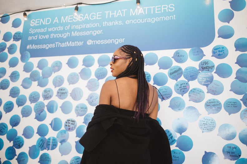 A woman added her message to the wall.