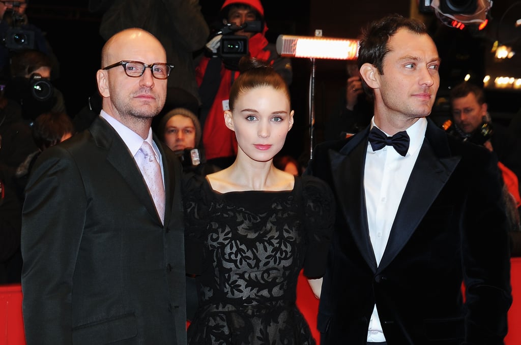 Rooney Mara stood in between Side Effects director Steven Soderbergh and co-star Jude Law at the red carept premiere. Rooney Mara stood in between Side Effects director Steven Soderbergh and co-star Jude Law at the red carept premiere.