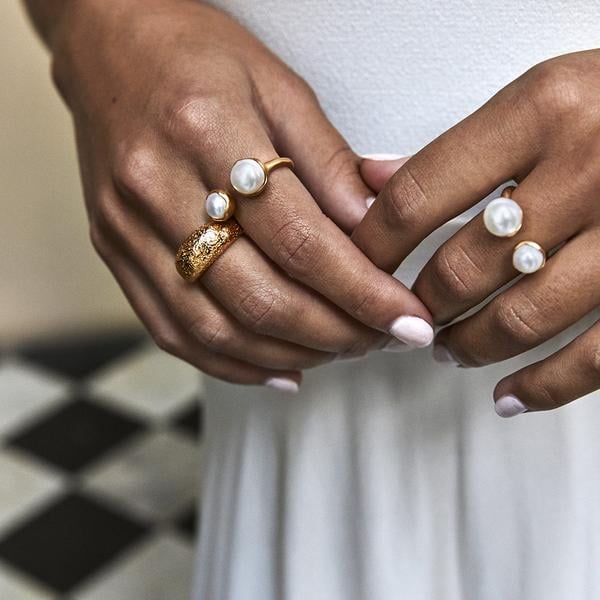"There's something so dreamy about a pearl ring. I loved how ethereal this Fairley Double Pearl Ring ($177) looked from the moment I saw it on the brand's website. It's a fun way to dress up, even if I'm just wearing sweats."