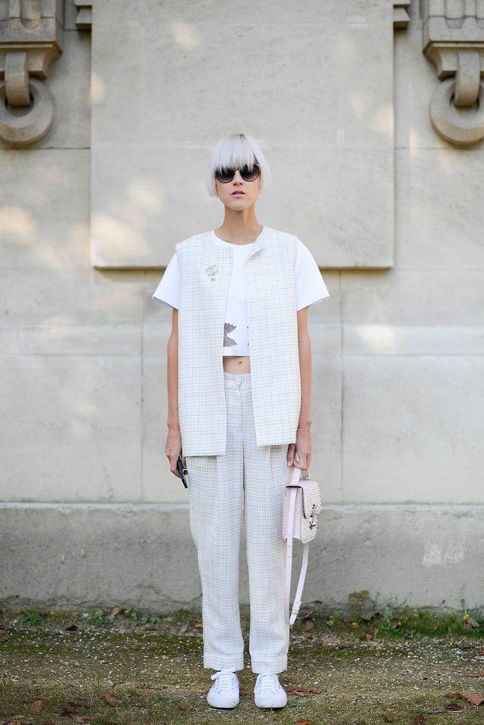 The subtle matching pattern on the vest and pants gives the look an air of sporty sophistication.