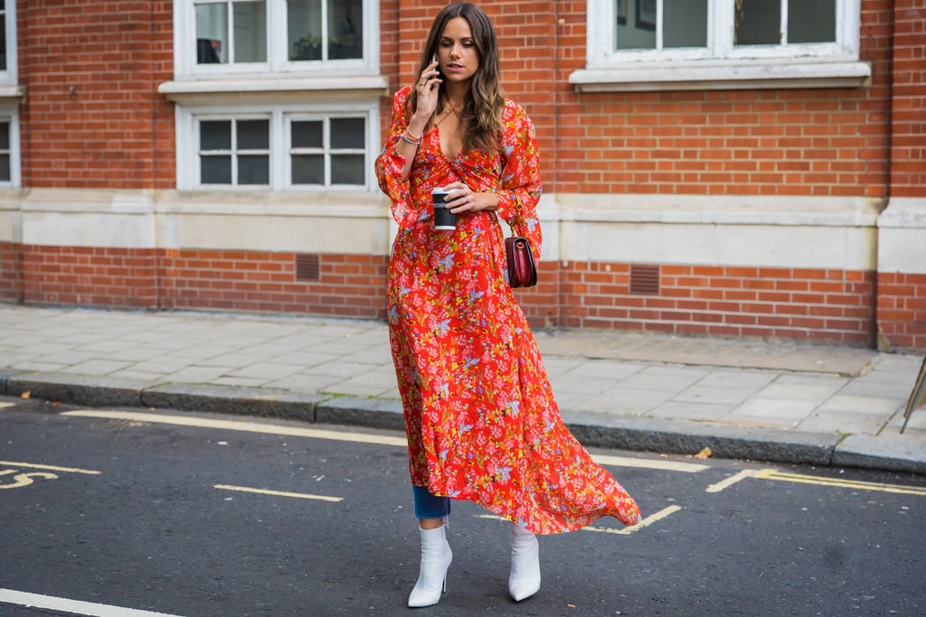 If you look closely, you'll see the coolest part of this look: the jeans peeking out from underneath her dress.