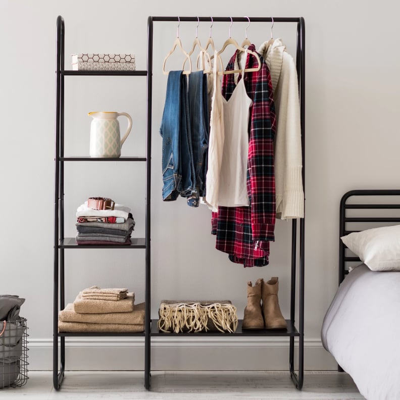 A Clothing Rack With Shelves: Reavis Clothes Rack