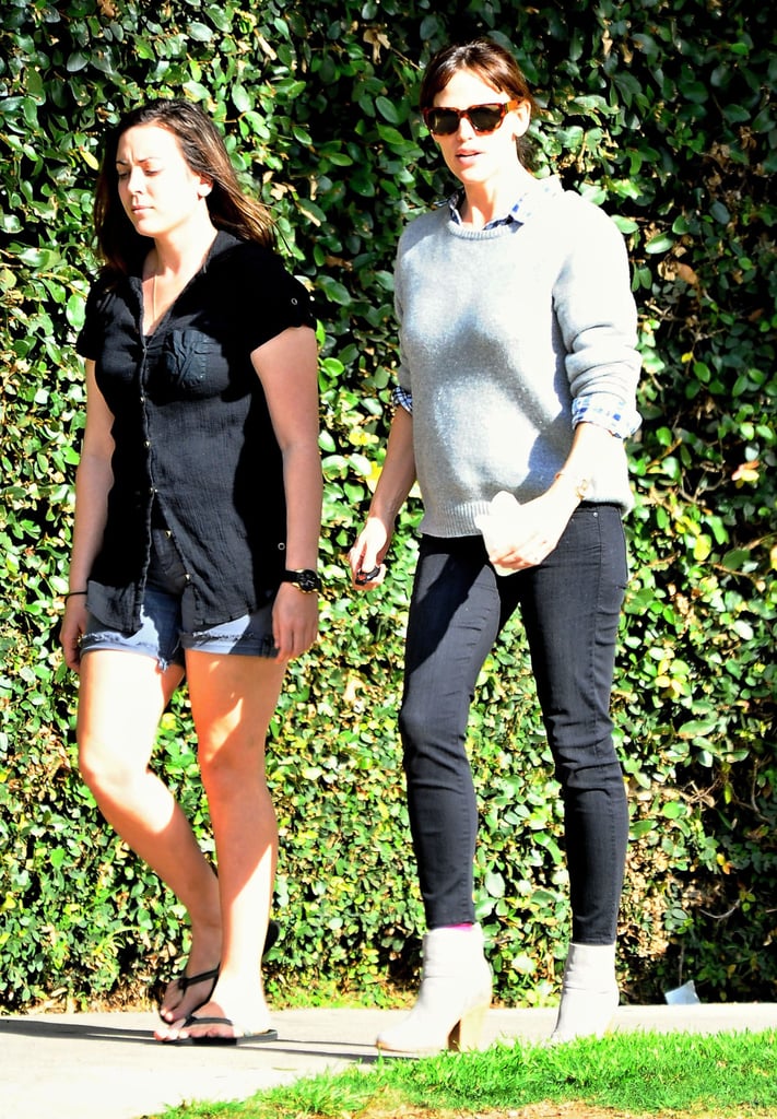 Jennifer Garner took a walk through Santa Monica, CA, with a pal on Thursday.