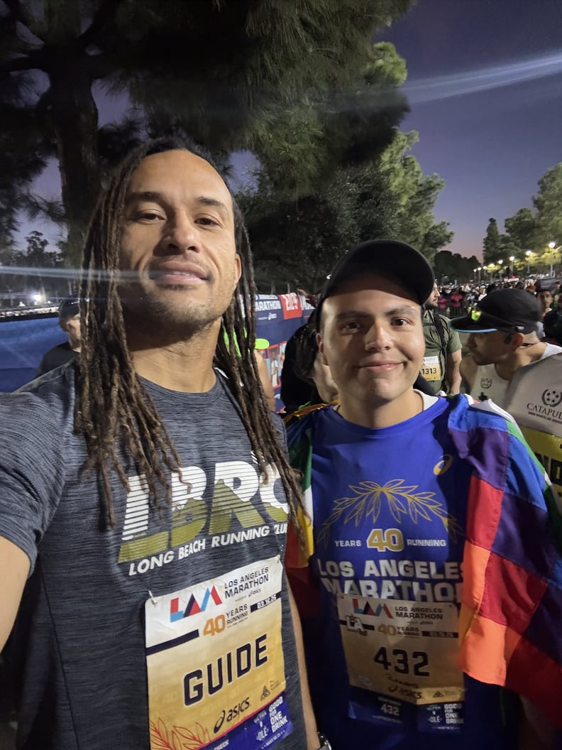 Victor Camara a marathon guide with his runner Romario.