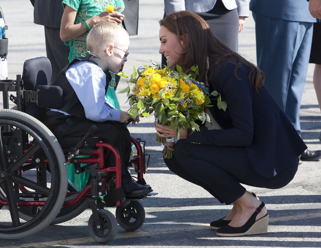 Kate Middleton shared an especially sweet moment with a little boy before departing from the Yellowknife airport in Canada in July 2011.