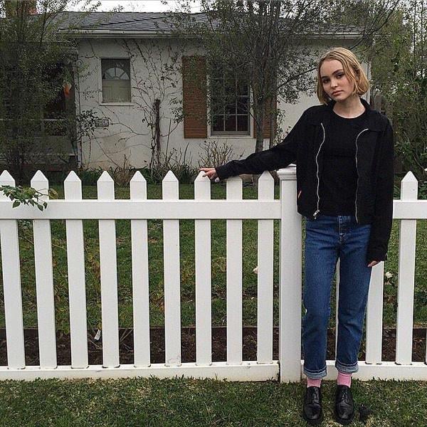 Lily-Rose Depp Looks Cool in a Bodysuit, Denim Shorts & Chanel Shoes