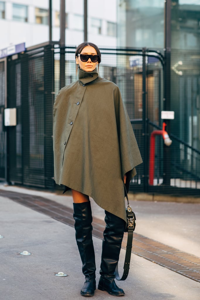 Bundle up underneath your poncho with a heat tech shirt, and wear tall, functional boots.