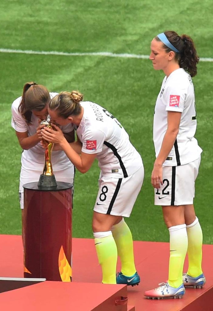 Amy Rodriguez and Son After World Cup Win