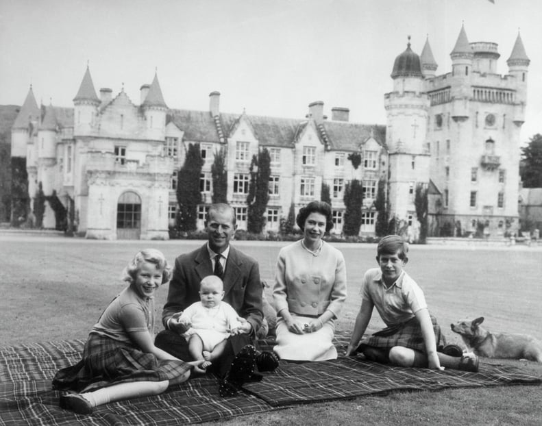 Queen Elizabeth with Prince Philip and their children, Andrew, Anne, & Charles, on a picnic in 1960.