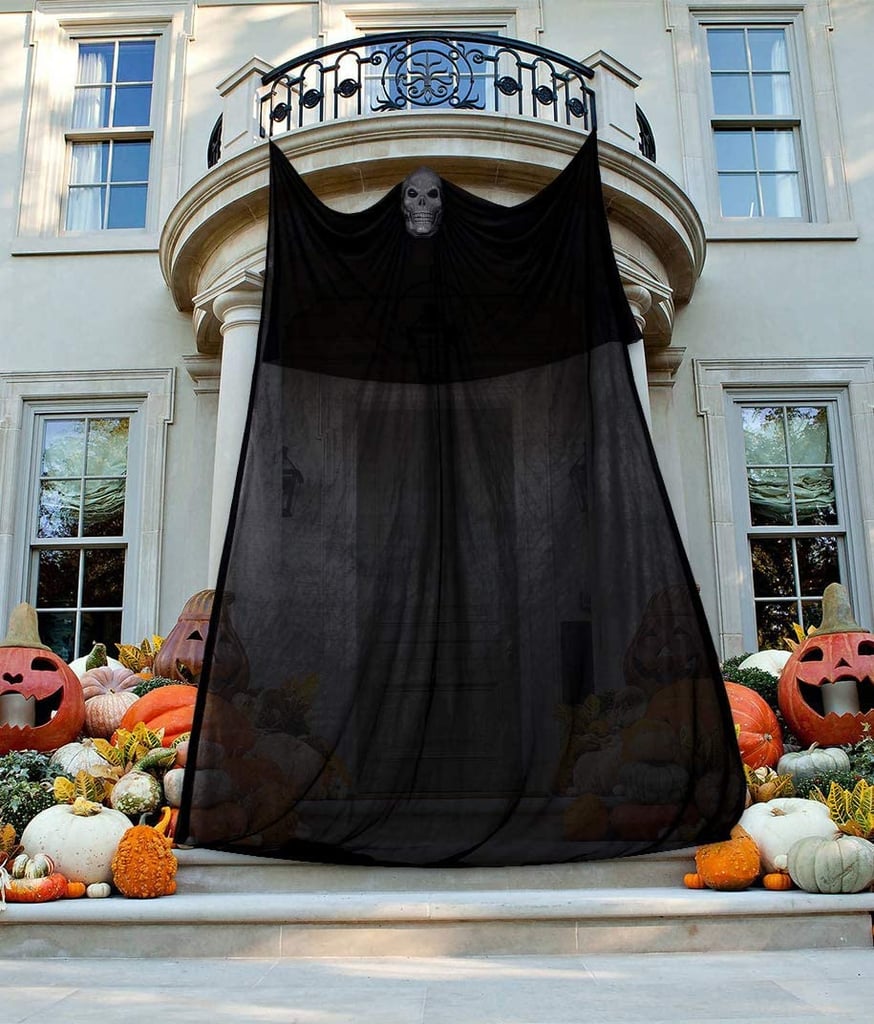 A Horrifying Welcome: Halloween Ghost Hanging Decoration