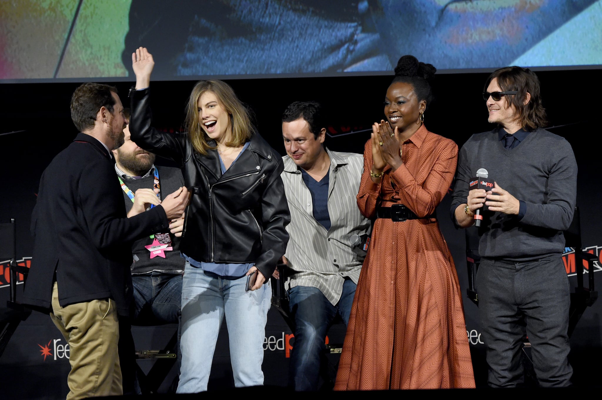 NEW YORK, NEW YORK - OCTOBER 05: (L-R) Scott Gimple, Robert Kirkman, Lauren Cohan, Dave Alpert, Danai Gurira and Norman Reedus speak onstage during a panel for AMC's The Walking Dead Universe including AMC's flagship series and the untitled new third series within The Walking Dead franchise at Hulu Theatre at Madison Square Garden on October 05, 2019 in New York City. (Photo by Jamie McCarthy/Getty Images for AMC)