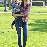 Even on her off-duty days, Miranda supplies enviable style, like she did here with a printed, bohemian-style blouse; classic denim; and Miu Miu shades.