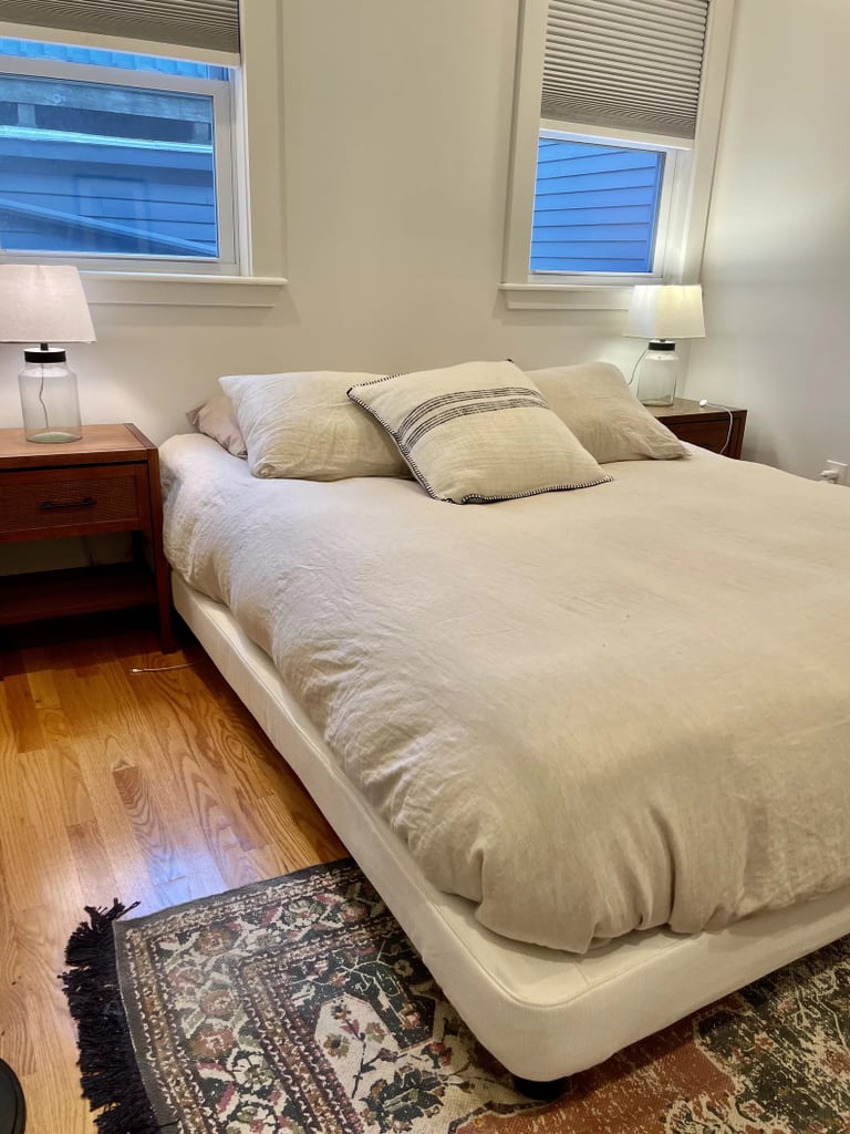 Casper Upholstered Bed Frame ($536, originally $595)
If you're looking for a basic platform bed that's high quality, affordable, and stylish, this Casper Upholstered Bed Frame comes to mind. The bed frame is simple and elegant, and its design can blend in with a number of decor schemes. It comes in colors midnight, gray, and natural. Read our editor-backed review of the Casper Upholstered Bed Frame to learn more.
What we love:
"It took me no more than 30 minutes to put it together by myself, it had easy-to-follow directions, and its one-tool assembly worked for the whole thing. It was the smoothest process I've had building a bed frame thus far, and I'm forever grateful to Casper for making it so easy." — Haley Lyndes, former assistant editor, Shopping
Its strong wooden slats prevent it from squeaking.
Who it's best for:
This is best for those looking for something minimal, low to the ground, and easy.
Who should avoid it:
This does not come with a headboard, so if you want a headboard included, consider other options in this guide.
The Details: Material: Woven polyester upholstery | Sizes: Queen and king | Color Options: 3