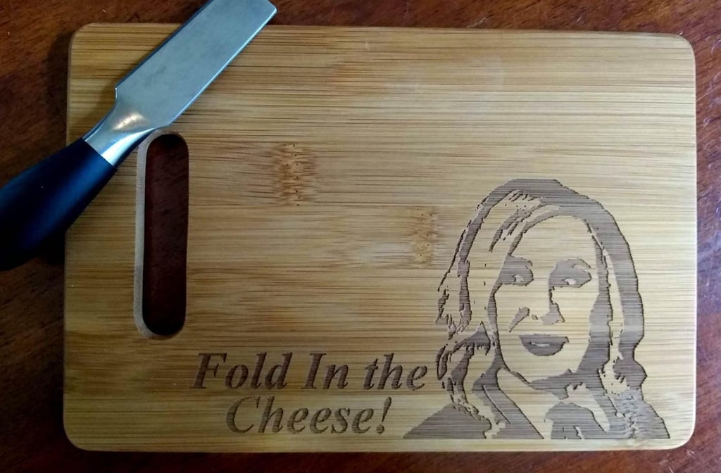 "Fold in the Cheese" Cutting Board