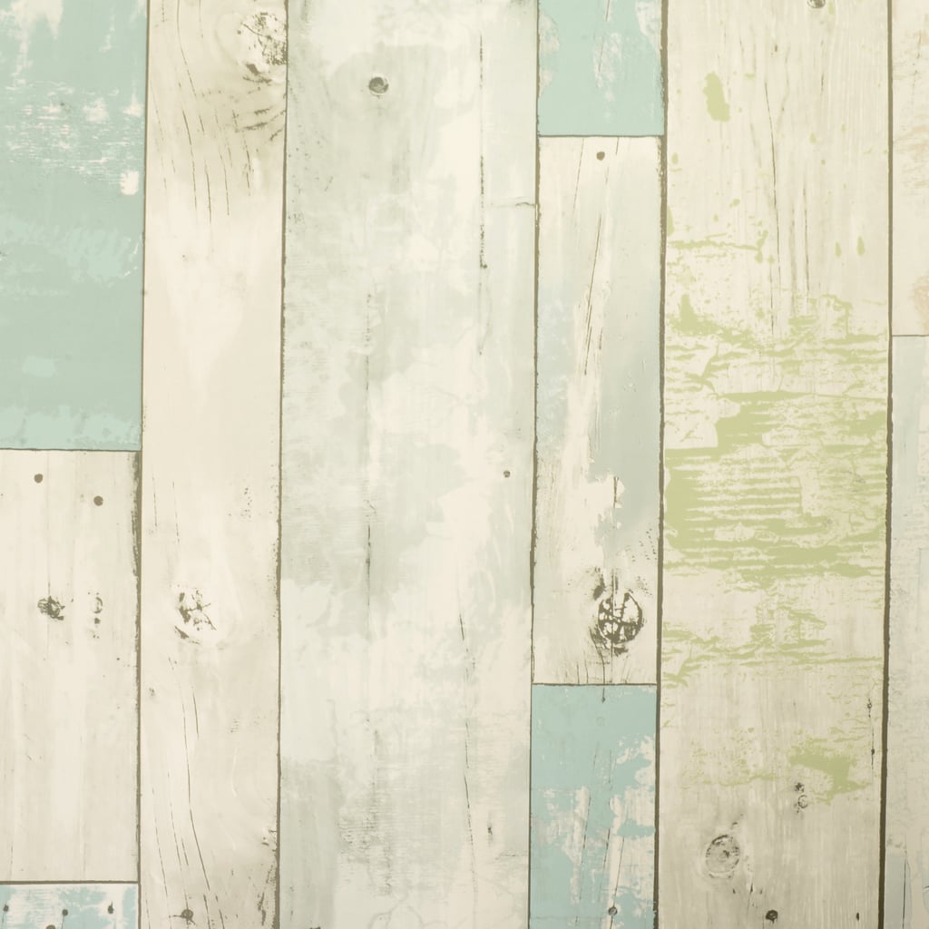 The Nicole Curtis Home removable wallpaper collection also comes in a beachwood print.