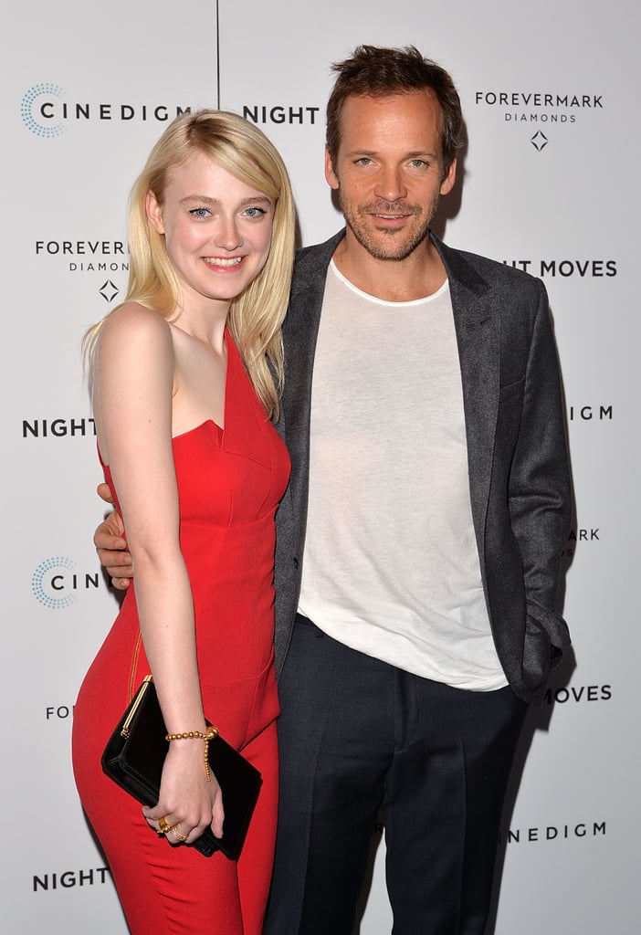 Dakota Fanning rocked a red jumpsuit at the Night Moves premiere in NYC on Tuesday alongside costar Peter Sarsgaard.