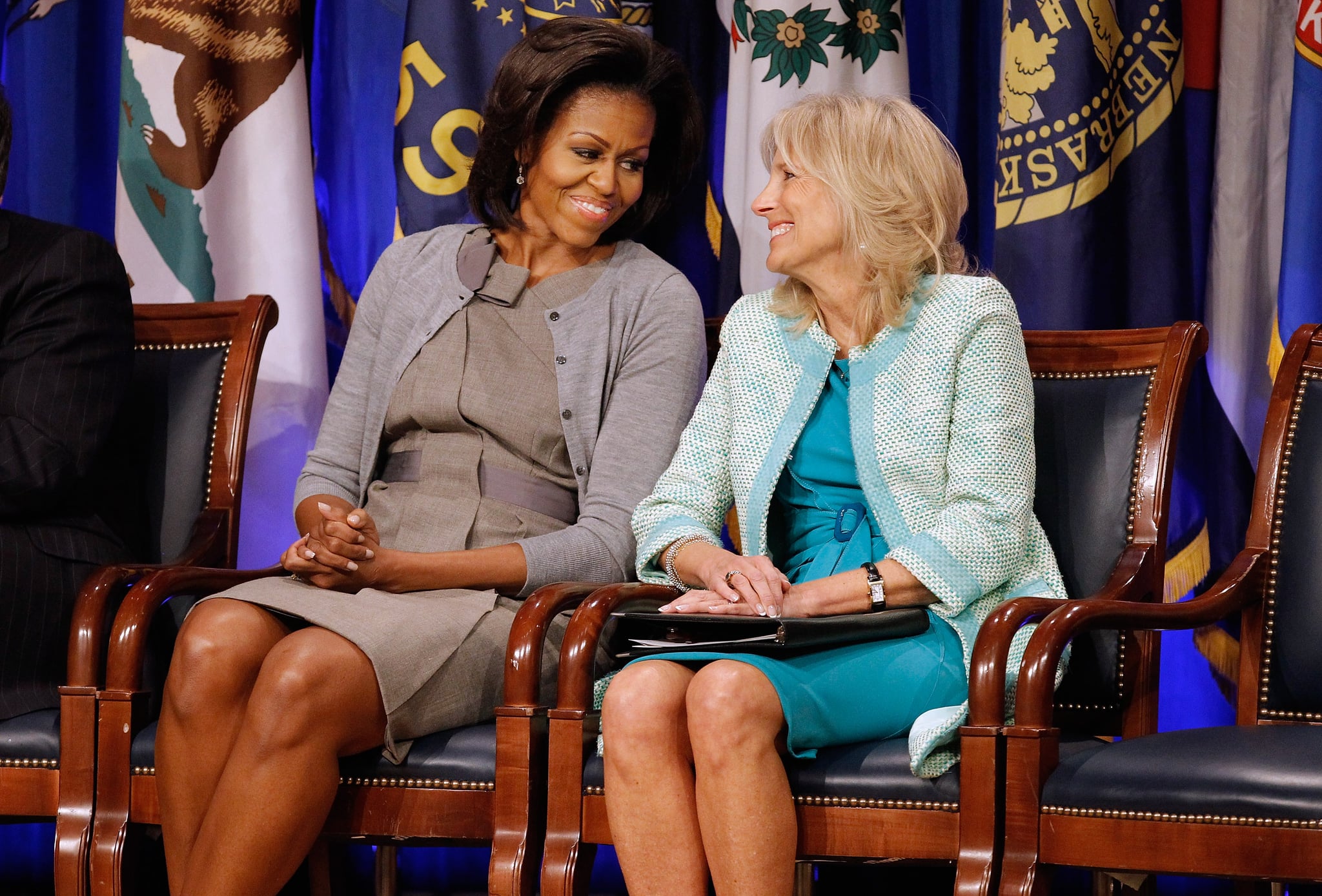 ARLINGTON, VA - FEBRUARY 15:  U.S. first lady Michelle Obama (L) and Dr. Jill Biden attend an event to announce a new report regarding military spouse employment at the Pentagon February 15, 2012 in Arlington, Virginia. The report, 