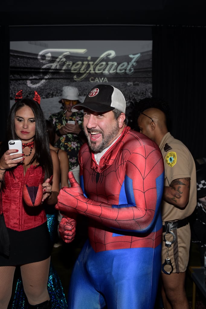 Joey Fatone's baseball cap was part of his Spiderman costume.