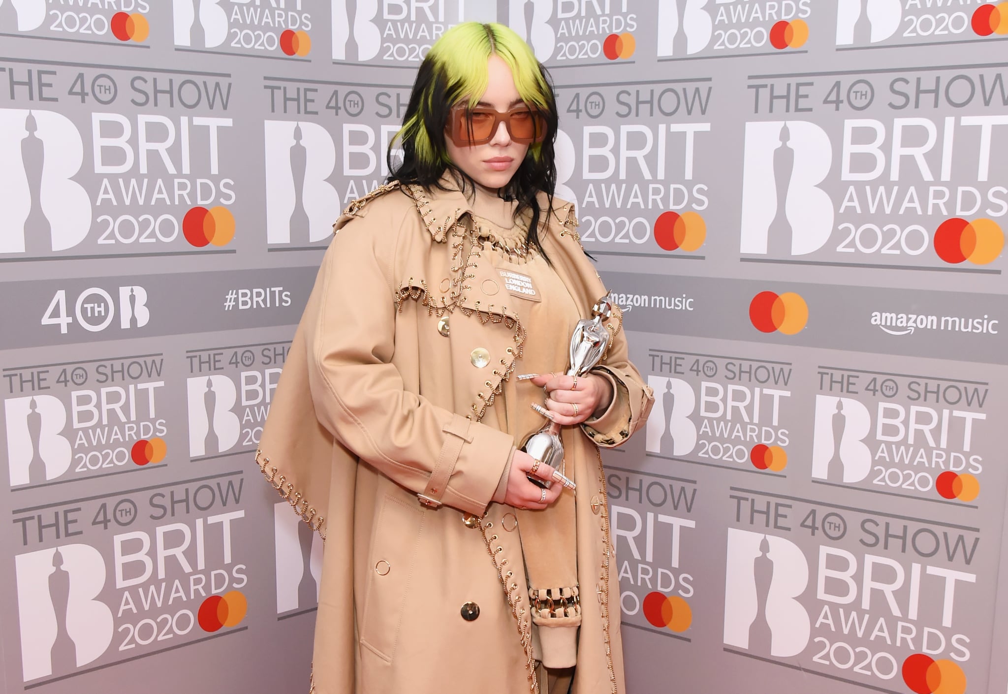 LONDON, ENGLAND - FEBRUARY 18: (EDITORIAL USE ONLY)  Billie Eilish, winner of the Best International Female Solo Artist award, poses in the winners room at The BRIT Awards 2020 at The O2 Arena on February 18, 2020 in London, England.  (Photo by David M. Benett/Dave Benett/Getty Images)
