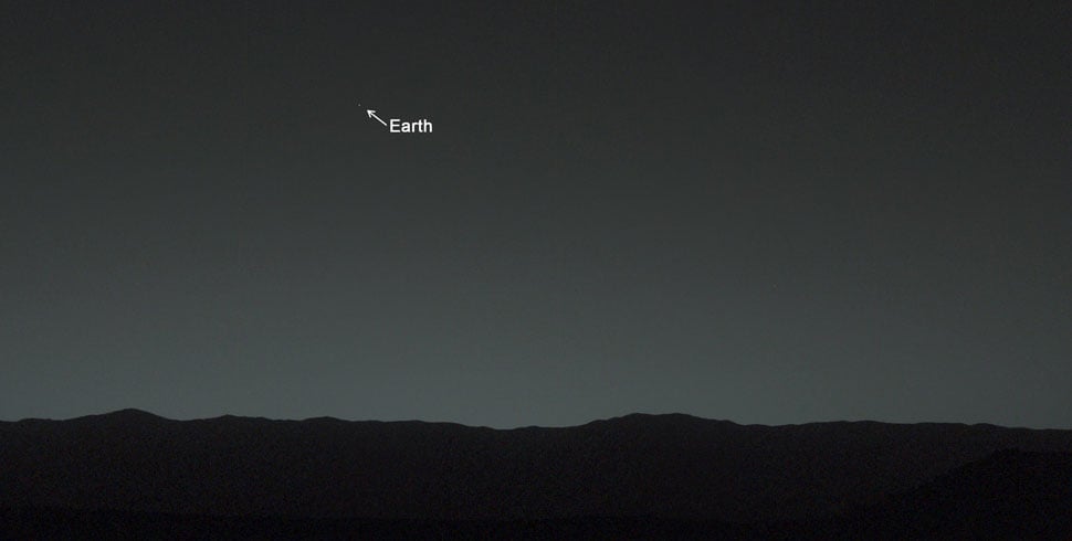 Earth looks teeny tiny in this picture taken from Mars by the Curiosity rover in February 2014. 
Source: NASA/JPL-Caltech/MSSS/TAMU