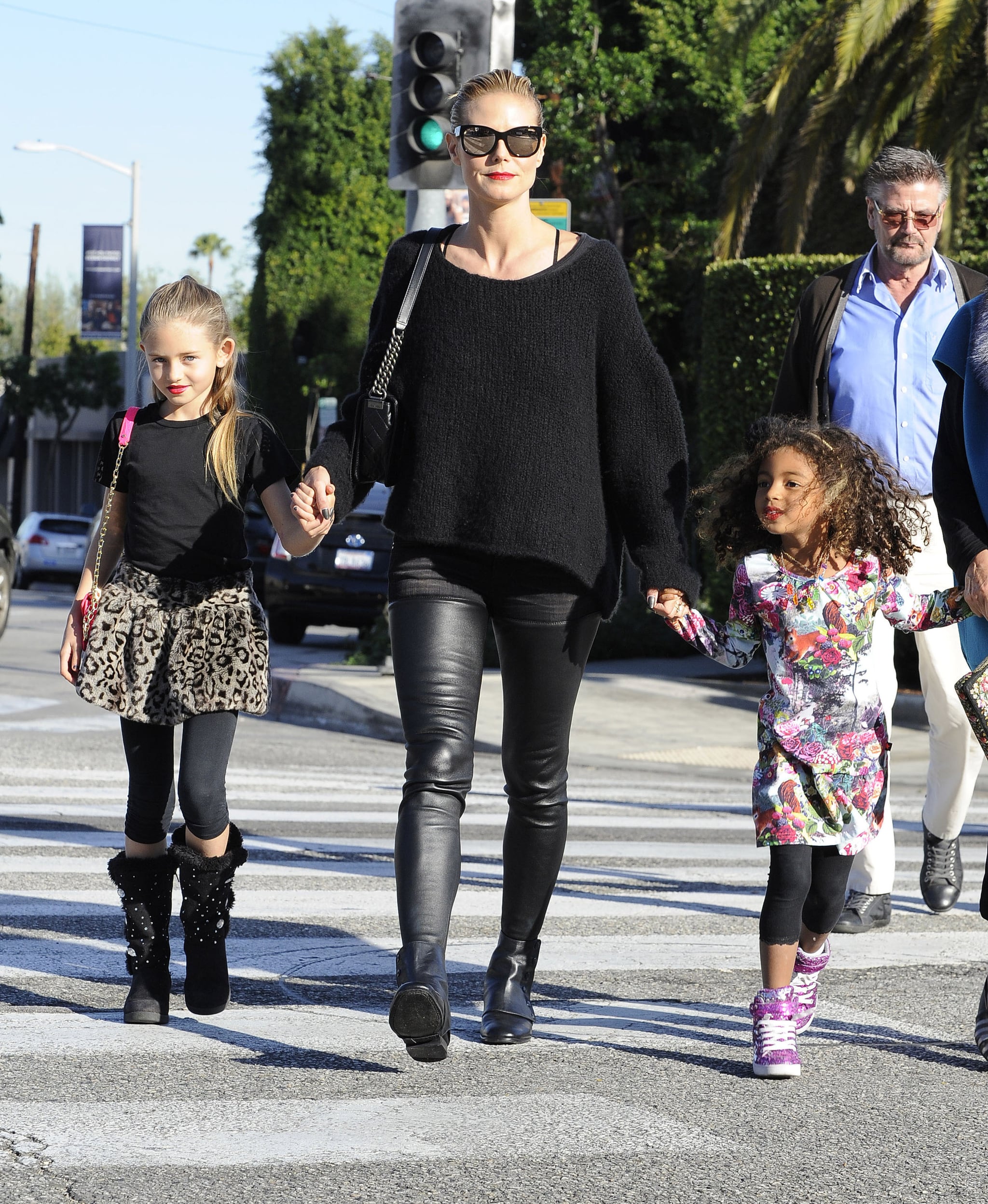 Heidi Klum kept her daughters, Leni and Lou, close for a family