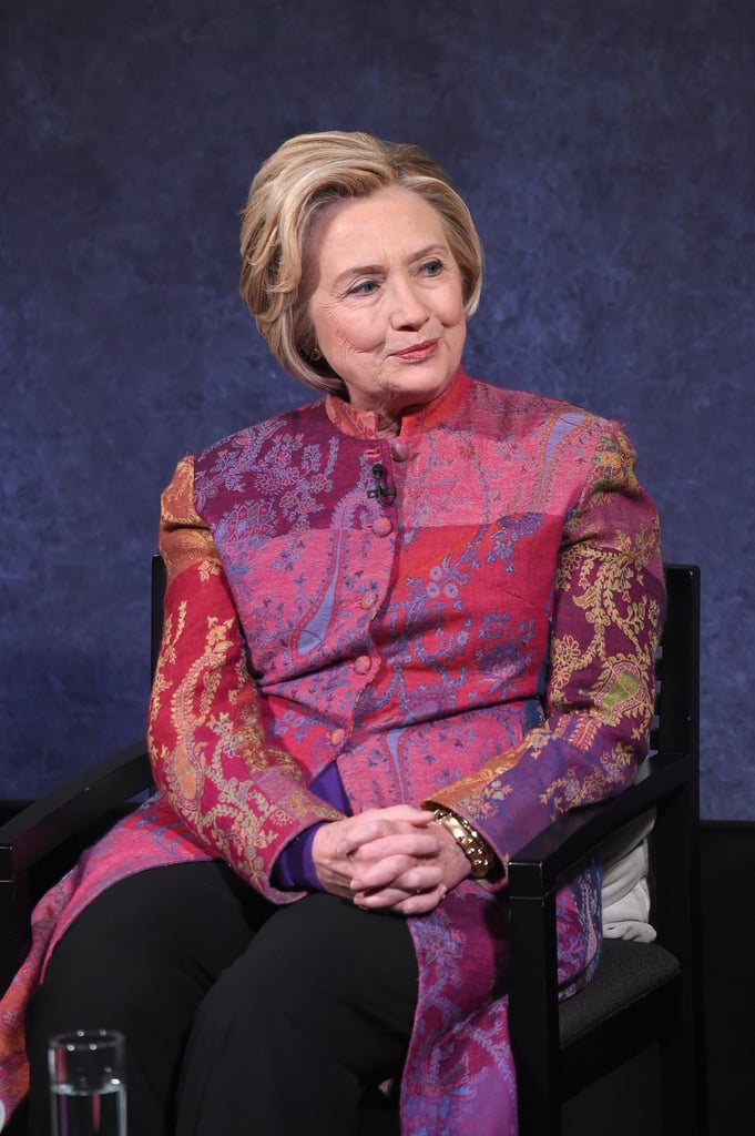 Wearing a long coat that featured a hint of Ultra Violet.