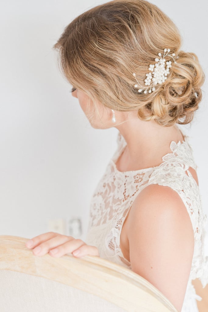 A combination of freshwater pearls and Swarovski crystals give this comb a sophisticated touch. If you want to wear your hair up for your big day, this handmade piece ($95) is way more gorgeous than bobby pins.