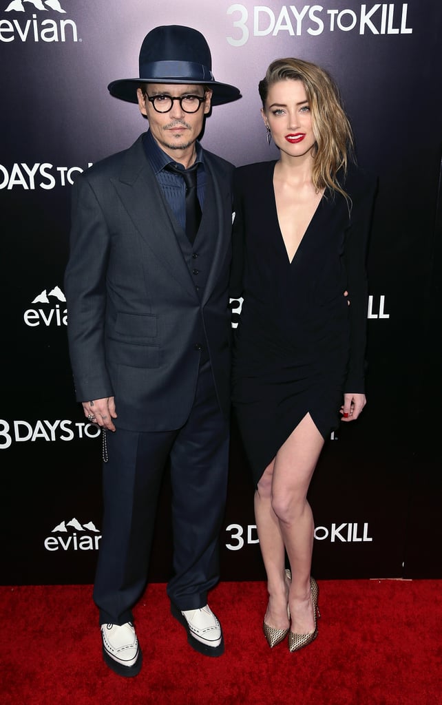 Johnny Depp joined fiancée Amber Heard for the premiere of her new movie, 3 Days to Kill, in LA on Wednesday.