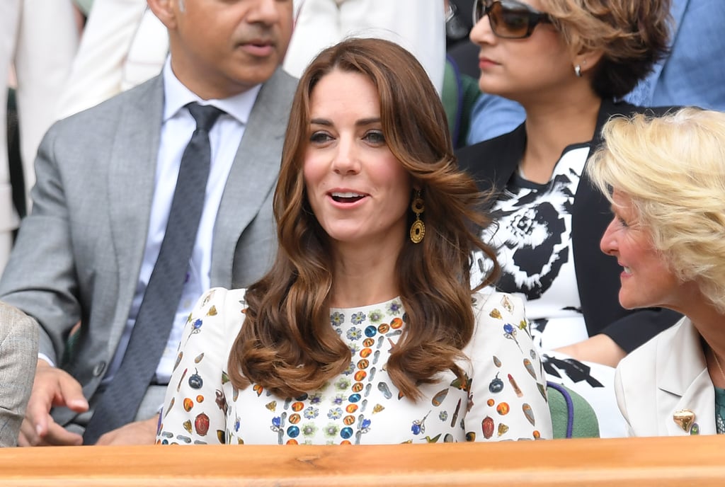 She Paired the Piece With Gold Drop Earrings