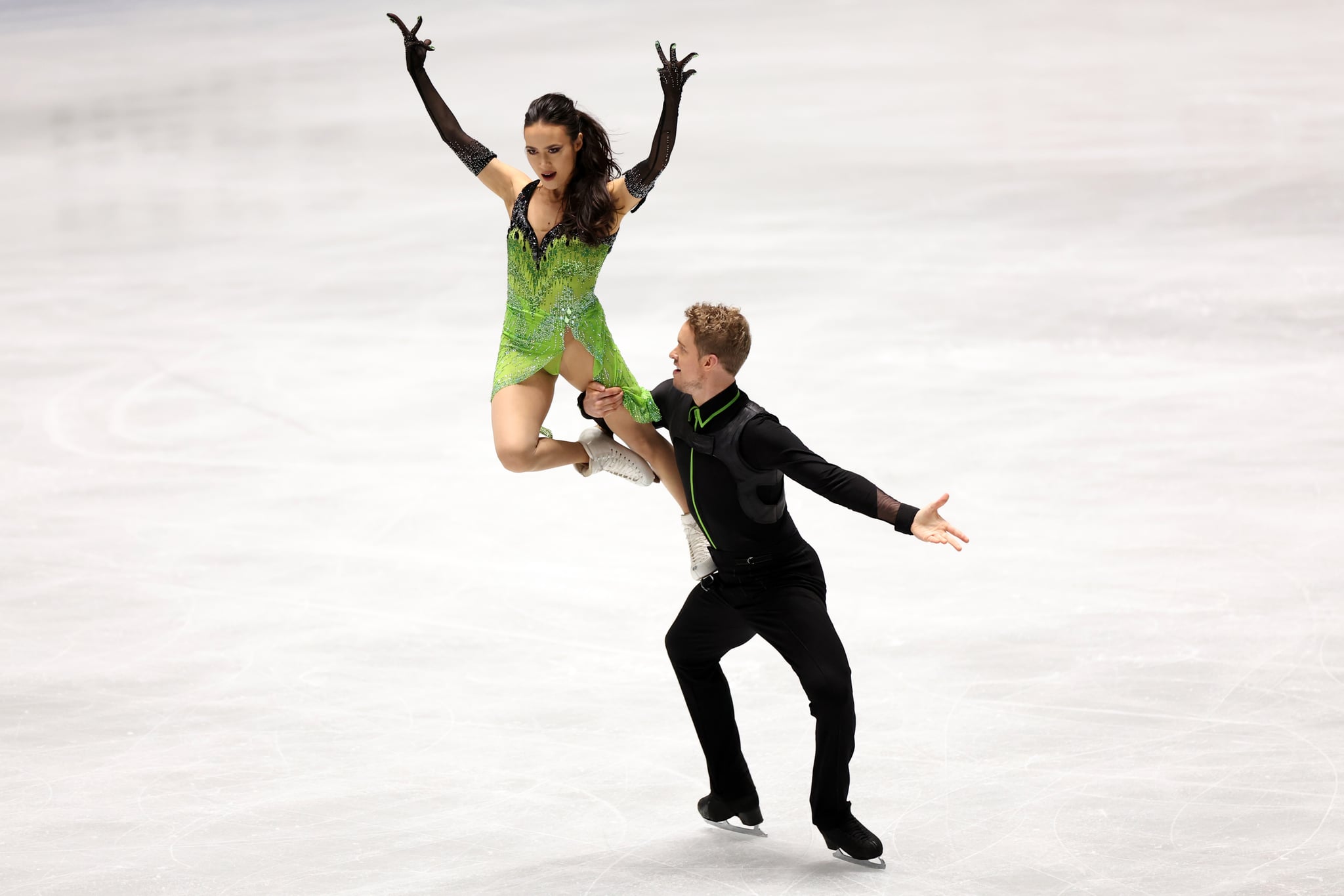 Madison Chock and Evan Bates of the United States compete in the Ice Dance Rhythm Dance during the ISU Grand Prix of Figure Skating - NHK Trophy at Yoyogi National Gymnasium on November 12, 2021.