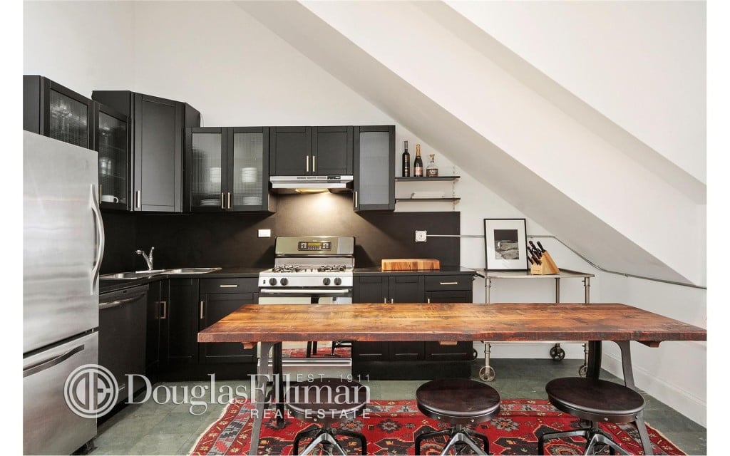 We wonder how often Jonah cooks in this industrial chic kitchen.