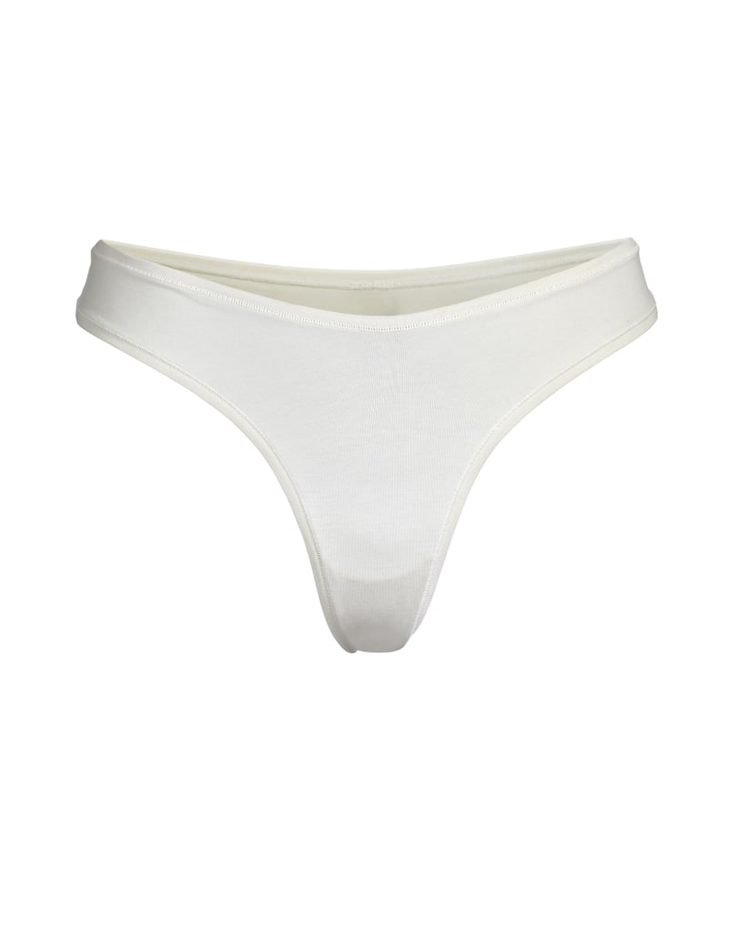 Skims Cotton Dipped Thong in Bone