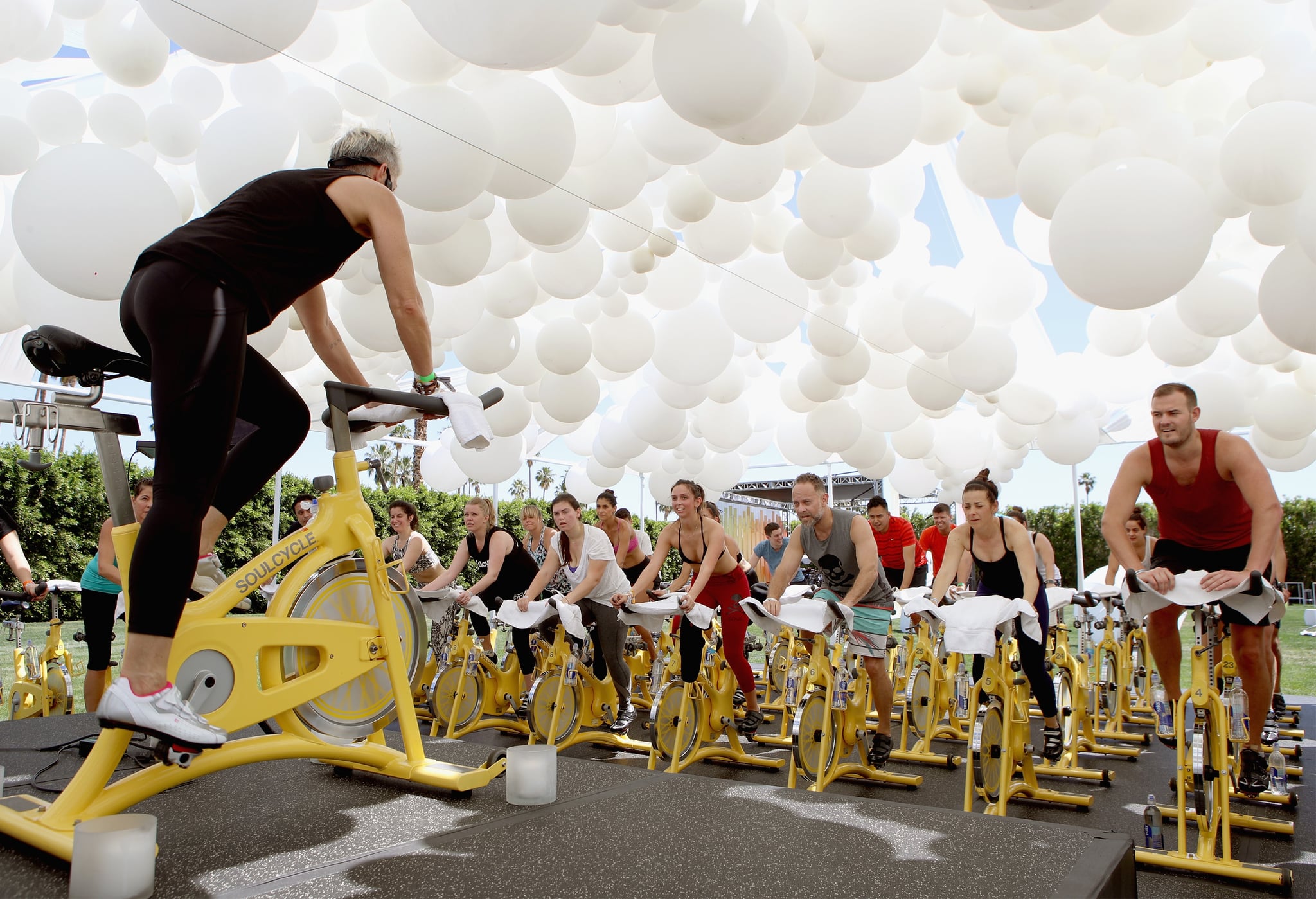 PALM SPRINGS, CA - APRIL 15:  Guests workout at the SoulCycle studio at the American Express Platinum House at The Parker Palm Springs on April 14, 2017 in Palm Springs, California.  (Photo by Ari Perilstein/Getty Images for American Express)
