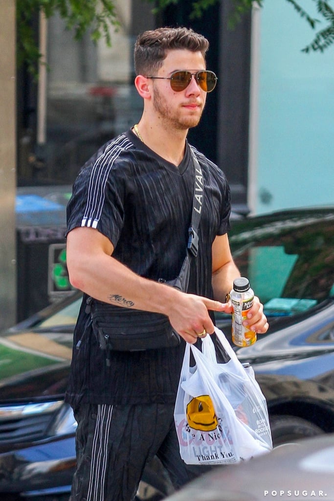 In case you haven't heard the news yet, Nick Jonas and Priyanka Chopra are engaged! The 25-year-old singer reportedly popped the question to the 36-year-old actress during her birthday celebration in London earlier this month. While the couple have yet to publicly confirm the news, on Sunday, Nick was spotted out for the first time during a liquor store run in NYC. Nick picked up a six-pack of beer and cooled down with a bottle of orange juice, but Priyanka wasn't with him this time around. 
Nick and Priyanka have been friends for quite some time now, though they only started dating two months ago. Still, things appear to be getting serious pretty quickly. Not only have they both already met each other's families, but apparently, the pair also hung out with Prince Harry and Meghan Markle during their recent trip to London. Congrats to Nick and Priyanka!

    Related:

            
            
                                    
                            

            30 Times Priyanka Chopra and Nick Jonas Made Us Say, "DAMN, They Look Good Together!"