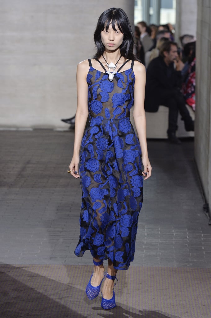 The exact same shade of blue just rolled down the Roland Mouret runway, this time in the form of a floral midi stitched with swirling flowers. Kate might add cap sleeves to the piece, and perhaps style it with plain pumps.