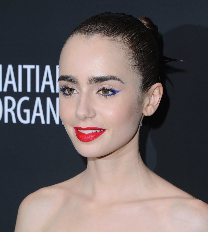 Lily Collins With Blue Liner and Red Lips