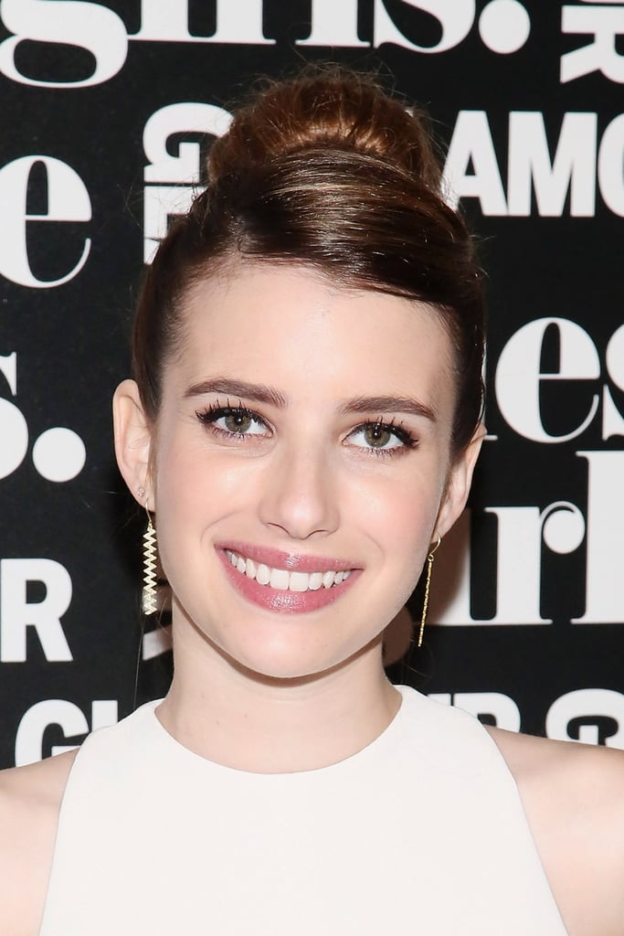 Don't want to let your fringe hang? Take note of Emma Roberts's style and sweep your bangs to the side with a part.