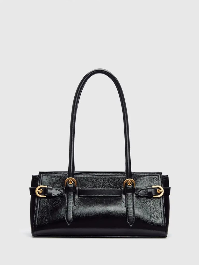 Reformation Beatrice Shoulder Bag ($336, originally $448)
We love a Reformation sale (and I'm guessing Taylor Swift does too, since she's constantly spotted in the brand), and this one is well worth it. It's simple: 25 percent off everything. Whether it's the corset top Swift was spotted wearing on a date with fiancé Travis Kelce or something entirely different, it's definitely worth a look.