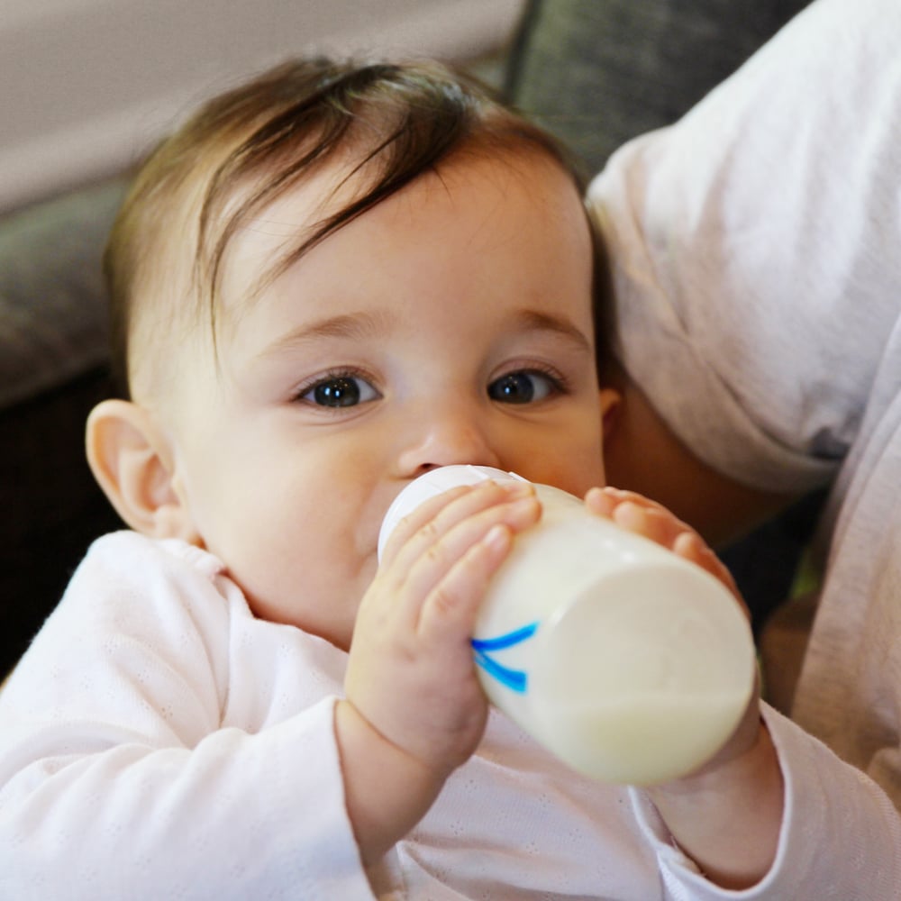 teething baby refusing milk
