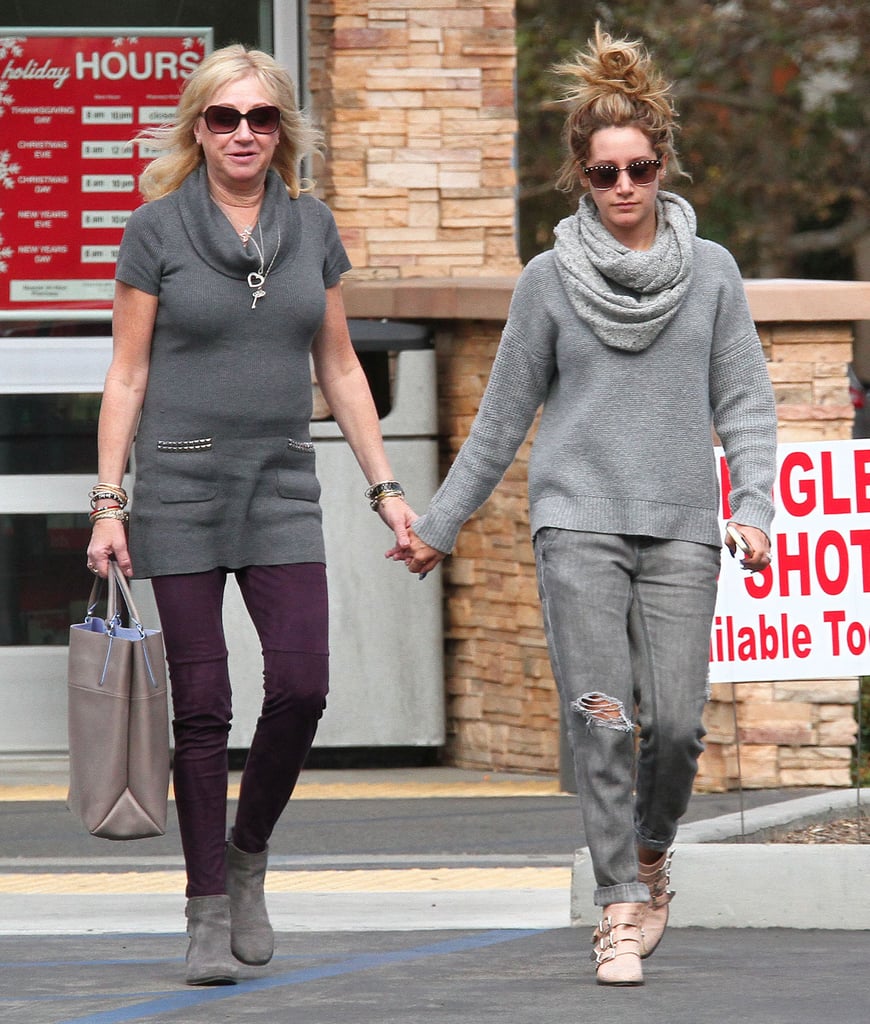 Ashley Tisdale held hands with her look-alike mom, Lisa Tisdale, in Studio City, CA, on Wednesday.