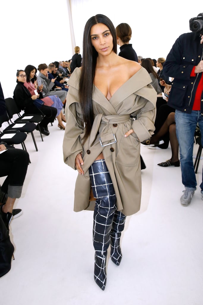 Kim Kardashian Wearing a Balenciaga Trench and Boots