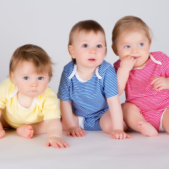 Quadruplet Babies Laugh Together at Dad