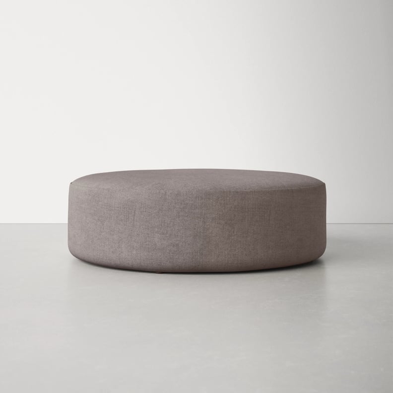 A Useful Ottoman: Kacy Polyester Round Standard Ottoman