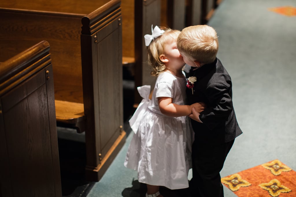 Adorable Flower Girls and Ring Bearers Kissing